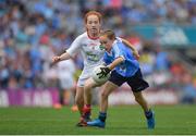 27 August 2017; Maggie Donaghy of Loreto PS, Co Dublin, representing Dublin, in action against Annie McGroddy of Devlinreagh NS, Co Donegal, representing Tyrone, during the INTO Cumann na mBunscol GAA Respect Exhibition Go Games at Dublin v Tyrone - GAA Football All-Ireland Senior Championship Semi-Final at Croke Park in Dublin. Photo by Brendan Moran/Sportsfile