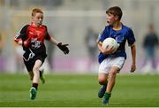 26 August 2017; Action between children from Dr Crokes GAA, Killarney, representing Kerry, and Ballintubber GAA, presenting Mayo, during the INTO Cumann na mBunscol GAA Respect Exhibition Go Games at half time during the GAA Football All-Ireland Senior Championship Semi-Final Replay match between Kerry and Mayo at Croke Park in Dublin. Photo by Piaras Ó Mídheach/Sportsfile