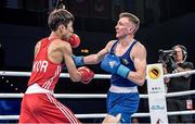 28 August 2017; Brendan Irvine, right, of Ireland exchanges punches with Inkyu Kim of Korea during their flyweight bout at the AIBA World Boxing Championships in Hamburg, Germany. Photo by AIBA via Sportsfile