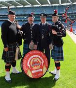 29 May 2012; In attendance at a Dublin Fire Brigade 150 year celebration photocall are Tim Zerr, Eugene Fire Pipes and Drums Band, Oregon, USA, left, John Daly, Chairman DFB Pipe Band, Chief Fire Officer Stephen Brady and Piper Jonathon Forbes. Dublin Fire Brigade and many of their friends from Fire and Police departments across the United States have travelled to Dublin to perform with them throughout the weekend, culminating in a performance at Croke Park for the Leinster GAA football senior championship 2012 quarter finals. Croke Park, Dublin. Picture credit: Ray McManus / SPORTSFILE