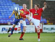 28 May 2012; Philip Hughes, Shelbourne, in action against Dean Zamba, Bray Wanderers. FAI Ford Cup, Second Round Replay, Shelbourne v Bray Wanderers, Tolka Park, Dublin. Picture credit: Ray Lohan / SPORTSFILE