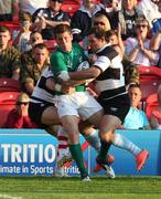 29 May 2012; Craig Gilroy, Ireland XV, breaks through the Barbarians defence on his way to scoring his side's first try. Rugby International, Barbarians v Ireland XV, Kingsholm, Gloucester, England. Picture credit: Matt Impey / SPORTSFILE
