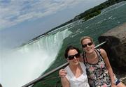 29 May 2012; Members of the 2010 and 2011 TG4/O'Neills Ladies Football All Star teams, Geraldine O'Flynn, left, and Juliet Murphy, both from Cork, on a visit to the Niagara Falls on the final day of the tour. 2012 TG4/O'Neills Ladies All-Star Tour, Niagara, Canada. Picture credit: Brendan Moran / SPORTSFILE