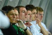 29 May 2012; Republic of Ireland's Richard Dunne, centre, sits in the dugout alongside, from left to right, Keith Andrews, team physio Ciaran Murray, Robbie Keane, Kevin Doyle and James McClean during the second half  of the game. International Friendly, Tuscan Selection v Republic of Ireland, Stadio Melani, Pistoia, Italy. Picture credit: David Maher / SPORTSFILE