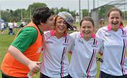26 May 2012; Tyrone players, from right, Gemma Begley, Joline Donnelly and Sinead McLaughlin have fun with a local 'Maor' before the game. 2012 TG4/O'Neills Ladies All-Star Tour Exhibition Game, 2010 All Stars v 2011 All Stars, Centennial Park, Toronto, Canada. Picture credit: Brendan Moran / SPORTSFILE