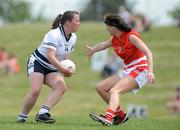 26 May 2012; Jo McNulty, Blues, in action against Heather Walshe, Reds, during a Canadian All Star Exhibition game. 2012 TG4/O'Neills Ladies All-Star Tour Exhibition Game, 2010 All Stars v 2011 All Stars, Centennial Park, Toronto, Canada. Picture credit: Brendan Moran / SPORTSFILE