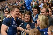 19 May 2012; Brian O'Driscoll, Leinster, is congratulated by his sisters Susan, centre, and Julie, right, following his side's victory. Heineken Cup Final, Leinster v Ulster, Twickenham Stadium, Twickenham, England. Picture credit: Stephen McCarthy / SPORTSFILE