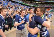 19 May 2012; John Cooney, Leinster, celebrates with supporters following his side's victory. Heineken Cup Final, Leinster v Ulster, Twickenham Stadium, Twickenham, England. Picture credit: Stephen McCarthy / SPORTSFILE