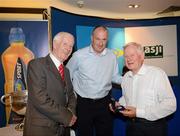 29 May 2012; Des Ferguson is made a presentation by ASJI President Peter Byrne in the company of Dublin Manager Pat Gilroy at a Lucozade Sport / ASJI event to celebrate the victory of the Dublin Football team in the National League Final in 1953. The Croke Park Hotel, Jones's Road, Dublin. Picture credit: Ray McManus / SPORTSFILE