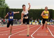 2 June 2012; Zak Irwin, centre, Sligo Grammer, Sligo, crosses the line to win the Intermediate Boys 100m event at the Aviva All Ireland Schools’ Track and Field Championships 2012. Tullamore Harriers AC, Tullamore, Co. Offaly. Picture credit: Tomas Greally / SPORTSFILE