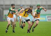 2 June 2012; PJ Nolan, Wexford, in action against Brendan Murphy, right, and Diarmuid Horan, Offaly. Leinster GAA Hurling Senior Championship Quarter-Final, Offaly v Wexford, O'Connor Park, Tullamore, Co. Offaly. Picture credit: Stephen McCarthy / SPORTSFILE