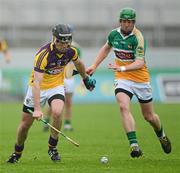 2 June 2012; PJ Nolan, Wexford, in action against Diarmuid Horan, Offaly. Leinster GAA Hurling Senior Championship Quarter-Final, Offaly v Wexford, O'Connor Park, Tullamore, Co. Offaly. Picture credit: Stephen McCarthy / SPORTSFILE