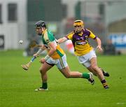 2 June 2012; Shane Dooley, Offaly, in action against Eoin Quigley, Wexford. Leinster GAA Hurling Senior Championship Quarter-Final, Offaly v Wexford, O'Connor Park, Tullamore, Co. Offaly. Picture credit: Ray McManus / SPORTSFILE