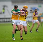 2 June 2012; Shane Dooley, Offaly, in action against Eoin Quigley, Wexford. Leinster GAA Hurling Senior Championship Quarter-Final, Offaly v Wexford, O'Connor Park, Tullamore, Co. Offaly. Picture credit: Ray McManus / SPORTSFILE