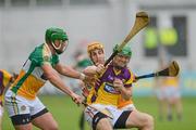 2 June 2012; Matthew O'Hanlon, Wexford, in action against Colin Egan, and Joe Bergin, left, Offaly. Leinster GAA Hurling Senior Championship Quarter-Final, Offaly v Wexford, O'Connor Park, Tullamore, Co. Offaly. Picture credit: Ray McManus / SPORTSFILE