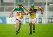 2 June 2012; Joe Bergin, Offaly, in action against Richie Kehoe, Wexford. Leinster GAA Hurling Senior Championship Quarter-Final, Offaly v Wexford, O'Connor Park, Tullamore, Co. Offaly. Picture credit: Stephen McCarthy / SPORTSFILE