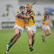 2 June 2012; Shane Dooley, Offaly, in action against Eoin Quigley, Wexford. Leinster GAA Hurling Senior Championship Quarter-Final, Offaly v Wexford, O'Connor Park, Tullamore, Co. Offaly. Picture credit: Ray McManus / SPORTSFILE