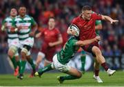 1 September 2017; Andrew Conway of Munster is tackled by Ian McKinley of Benetton during the Guinness PRO14 Round 1 match between Munster and Benetton at Irish Independent Park in Cork. Photo by Eóin Noonan/Sportsfile