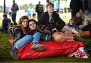 2 September 2017; Aisling Mahon, from left, Lauren McBride, both from Greystones, Co Wicklow, and Daniel Sabou, from Blanchardstown, Co Dublin, pictured watching the film &quot;Police Academy&quot; at Electric Ireland's Throwback Stage at Electric Picnic, during some 90s nostalgia fun. Electric Ireland, the official energy partner of Electric Picnic, will screen some rad old school movies with family friendly activities and the best poptastic throwback tunes throughout the weekend. Check out festival highlights at facebook.com/ElectricIreland #ThrowbackStage. Photo by Cody Glenn/Sportsfile