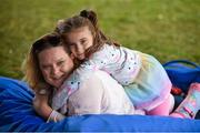 2 September 2017; Eimear Lynch, age 7, and Glenda Lynch, from Mountmellick, Co Laois, watching the film &quot;Police Academy&quot; at Electric Ireland's Throwback Stage at Electric Picnic, during some 90s nostalgia fun. Electric Ireland, the official energy partner of Electric Picnic, will screen some rad old school movies with family friendly activities and the best poptastic throwback tunes throughout the weekend. Check out festival highlights at facebook.com/ElectricIreland #ThrowbackStage. Photo by Cody Glenn/Sportsfile