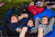 2 September 2017; Mícheál Mac Cíonna, from left, Ruairí Crawley, and Mark McNally, from Monaghan Town, pictured watching the film &quot;Police Academy&quot; at Electric Ireland's Throwback Stage at Electric Picnic, during some 90s nostalgia fun. Electric Ireland, the official energy partner of Electric Picnic, will screen some rad old school movies with family friendly activities and the best poptastic throwback tunes throughout the weekend. Check out festival highlights at facebook.com/ElectricIreland #ThrowbackStage. Photo by Cody Glenn/Sportsfile