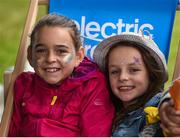 2 September 2017; Sisters Roisín Hogan, age 11, and Aba Hogan, age 8, from Camross, Co Laois, watching the film &quot;Police Academy&quot; at Electric Ireland's Throwback Stage at Electric Picnic, during some 90s nostalgia fun. Electric Ireland, the official energy partner of Electric Picnic, will screen some rad old school movies with family friendly activities and the best poptastic throwback tunes throughout the weekend. Check out festival highlights at facebook.com/ElectricIreland #ThrowbackStage. Photo by Cody Glenn/Sportsfile