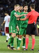 2 September 2017; Republic of Ireland players James McClean, Jonathan Walters and Shane Long, remonstrate with referee Ivan Kružliak after he gave James McClean a yellow card, during the FIFA World Cup Qualifier Group D match between Georgia and Republic of Ireland at Boris Paichadze Dinamo Arena in Tbilisi, Georgia. Photo by David Maher/Sportsfile