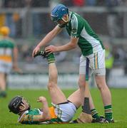 2 June 2012; Offaly goalkeeper James Dempsey assists team-mate David Franks during the closing minutes of the game. Leinster GAA Hurling Senior Championship Quarter-Final, Offaly v Wexford, O'Connor Park, Tullamore, Co. Offaly. Picture credit: Ray McManus / SPORTSFILE