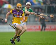 2 June 2012; David Redmond, Wexford, in action against Kevin Brady, Offaly. Leinster GAA Hurling Senior Championship Quarter-Final, Offaly v Wexford, O'Connor Park, Tullamore, Co. Offaly. Picture credit: Ray McManus / SPORTSFILE