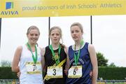 2 June 2012; Gold medal winner Siofra Clerigh Buttner, centre, from Coláiste Íosagáin, Dublin, with second place Aislinn Crossey, left, from Sacred Heart Newry, Co. Down, and third place Ella Davis, right, from, Victoria College Belfast, Co. Antrim, after the Intermediate Girls 800m at the Aviva All Ireland Schools’ Track and Field Championships 2012. Tullamore Harriers AC, Tullamore, Co. Offaly. Picture credit: Matt Browne / SPORTSFILE