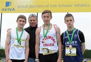 2 June 2012; Gold medal winner Sean Lawlor, centre, from Kylemore College, Dublin, with second place Eoin Doherty, left, from Drimnagh Castle, Dublin, third place Patrick O'Neill, right, from Abbey CC, Waterford, and Senator Eamonn Coghlan, after the Junior Boys 200m at the Aviva All Ireland Schools’ Track and Field Championships 2012. Tullamore Harriers AC, Tullamore, Co. Offaly. Picture credit: Matt Browne / SPORTSFILE