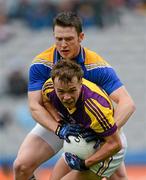 3 June 2012; Conor Carty, Wexford, in action against Mickey Quinn, Longford. Leinster GAA Football Senior Championship Quarter-Final, Longford v Wexford, Croke Park, Dublin. Picture credit: Stephen McCarthy / SPORTSFILE