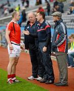 3 June 2012; Louth's Darren Clarke talks to manager Peter Fitzpatrick and selectors Gerry Cummiskey and Brian McEniff as he goes through a fitness test before the game.  Leinster GAA Football Senior Championship Quarter-Final, Louth v Dublin, Croke Park, Dublin. Picture credit: Ray McManus / SPORTSFILE