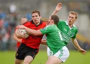 3 June 2012; Aidan Carr, Down, in action against Brian Og Maguire and Tommy McElroy, Fermanagh. Ulster GAA Football Senior Championship Quarter-Final, Fermanagh v Down, Brewster Park, Enniskillen, Co. Fermanagh. Picture credit: Oliver McVeigh / SPORTSFILE