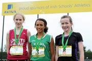 2 June 2012; Gold medal winner Nadia Power, St. MacDara's Community College, Dublin, with second place Clodagh O'Reilly, left, Loreto College, Co. Cavan, and third place Bronagh Maguire, right, Our Ladys & St Patricks, Co. Down, after the Junior Girls 1500m at the Aviva All Ireland Schools’ Track and Field Championships 2012. Tullamore Harriers AC, Tullamore, Co. Offaly. Picture credit: Matt Browne / SPORTSFILE