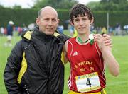 2 June 2012; Gold medal winner Eoin Strutt, St Fintan's High School, Dublin, with his Dad Francis after the Under 16 Boys 1 Mile at the Aviva All Ireland Schools’ Track and Field Championships 2012. Tullamore Harriers AC, Tullamore, Co. Offaly. Picture credit: Matt Browne / SPORTSFILE