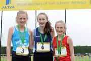 2 June 2012; Gold medal winner Eileen Rafter, Ursuline Thurles, Co. Tipperary, centre, with second place Anna Sheeha, left, Loreto College, Kilkenny City, Co. Kilkenny, and third place Zoe Carruthers, right, Friends School, Lisburn, Co. Antrim, after the under 16 Girls 1 Mile at the Aviva All Ireland Schools’ Track and Field Championships 2012. Tullamore Harriers AC, Tullamore, Co. Offaly. Picture credit: Matt Browne / SPORTSFILE