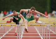 2 June 2012; Mark McGarvey, St.Joseph's Boys School, Derry, on his way to winning the Senior Boys 110m Hurdles event at the Aviva All Ireland Schools’ Track and Field Championships 2012. Tullamore Harriers AC, Tullamore, Co. Offaly. Picture credit: Tomas Greally / SPORTSFILE