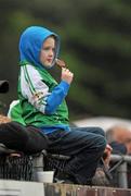 3 June 2012; London supporter Michael Dunning, age 6, enjoys an ice-pop during the game. Connacht GAA Football Senior Championship Quarter-Final, London v Leitrim, Emerald Park, Ruislip, London. Picture credit: Diarmuid Greene / SPORTSFILE