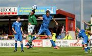 4 June 2012; Greg Cunningham, Republic of Ireland, heads his side's second goal despite the attention of Davide Santon, Italy. UEFA Under-21 Championship 2013 Qualifier, Republic of Ireland v Italy, Showgrounds, Sligo. Picture credit: Stephen McCarthy / SPORTSFILE