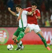 4 June 2012; Kevin Doyle, Republic of Ireland, in action against Peter Halmosi, Hungary. Friendly International, Hungary v Republic of Ireland, Ferenc Puskás Stadium, Budapest, Hungary. Picture credit: David Maher / SPORTSFILE