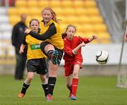 5 June 2012; Caoimhe Molloy, left, Scoil Mhuire, Glenties, Co. Donegal, in action against Aoibheann Kavanagh, Piltown NS, Co. Waterford. An Post FAI Primary Schools 5-a-Side All-Ireland Finals, Tallaght Stadium, Tallaght, Dublin. Picture credit: Barry Cregg / SPORTSFILE