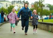 5 June 2012; Former Ireland and Leinster rugby star Shane Byrne with his daughters, twins Kerry, left, and Alex, age 9, taking part in the Olympic Dream Run, Howth, Co. Dublin. Photo by Sportsfile