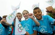 5 June 2012; Harry Ryan, left, Tess Jennings, and Jordan O'Connor, all aged 9 and from Howth, Co. Dublin, prior to taking part in the Olympic Dream Run, Howth, Co. Dublin. Photo by Sportsfile