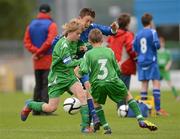 5 June 2012; Alex O'Reagon, centre, Zion Parish Primary School, Rathgar, Dublin, in action against  Jake Mortimer, left, and Daniel Pryce Williams, right, Letterfrack NS, Co. Galway. An Post FAI Primary Schools 5-a-Side All-Ireland Finals, Tallaght Stadium, Tallaght, Dublin. Picture credit: Barry Cregg / SPORTSFILE