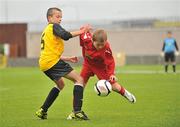 5 June 2012; Caoilfhionn O'Dea, right, Annagh NS, Miltown Malbay, Co. Clare, in action against James Smith, St. Patrick's Ns, Kilnaleck, Co. Cavan. An Post FAI Primary Schools 5-a-Side All-Ireland Finals, Tallaght Stadium, Tallaght, Dublin. Picture credit: Barry Cregg / SPORTSFILE