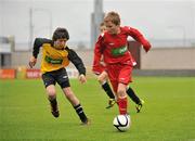 5 June 2012; Daniel Walsh, right, Annagh NS, Miltown Malbay, Co. Clare, in action against Patrick O'Reilly, St. Patrick's Ns, Kilnaleck, Co. Cavan. An Post FAI Primary Schools 5-a-Side All-Ireland Finals, Tallaght Stadium, Tallaght, Dublin. Picture credit: Barry Cregg / SPORTSFILE