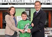 5 June 2012; Aaron Connolly, Brierhill NS, Co. Galway, receives the player of the tournament award in the &quot;B&quot; Boy's Schools category from Miriam Malone, FAI Grass Roots and Barney Whelan, Director of Communications and Corperate Affairs with An Post. An Post FAI Primary Schools 5-a-Side All-Ireland Finals, Tallaght Stadium, Tallaght, Dublin. Picture credit: Barry Cregg / SPORTSFILE