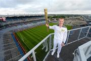 6 June 2012; Kilkenny hurler and 10 time hurling All-Star Henry Shefflin on the Etihad Skyline at Croke Park with the Olympic Flame during the 2012 Olympic Torch Run in Ireland. Croke Park, Dublin. Picture credit: Brendan Moran / SPORTSFILE