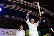 6 June 2012; Irish Olympian & 5000m silver medallist Sonia O'Sullivan and her daughter Sophie, age 10, with the Olympic Flame during the London 2012 Olympic Torch Relay. St. Stephen's Green, Dublin. Picture credit: Brian Lawless / SPORTSFILE